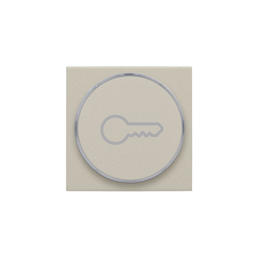 Afwerkingsset met doorschijnende ring met sleutelsymbool voor drukknop sand textured