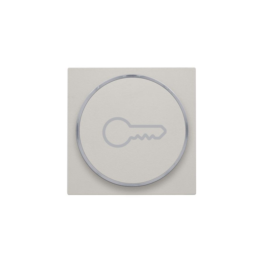 Afwerkingsset met doorschijnende ring met sleutelsymbool voor drukknop